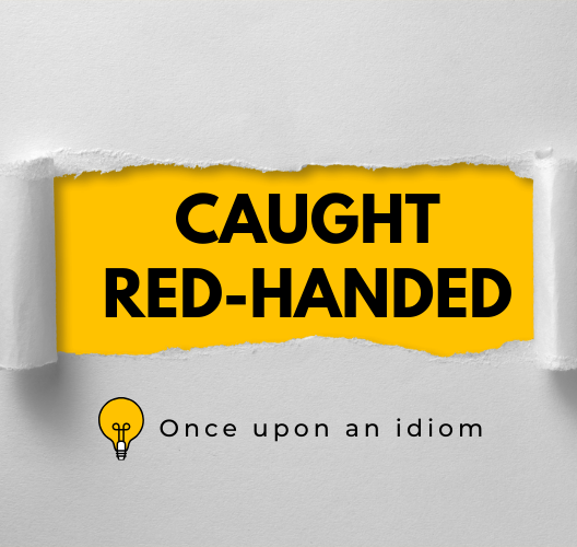 Nguồn Gốc Thành Ngữ Caught Red-Handed Và Ví Dụ